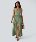 Robe longue fluide fendue avec poches latérales, dos nu et effet torsadé