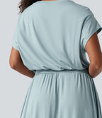 Robe de travail mi-longue fluide gainante à manches chauve-souris avec poches