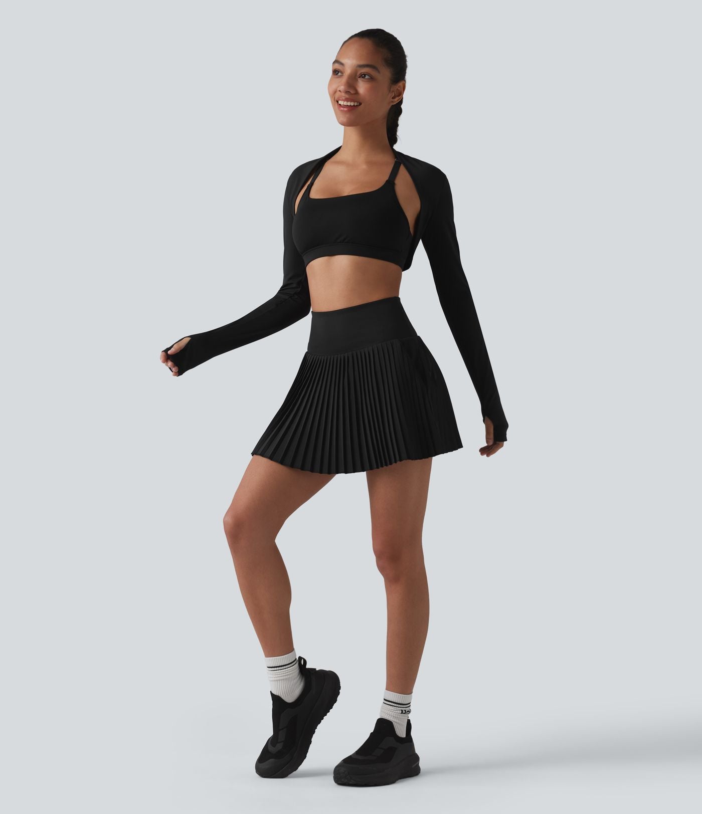 Breezeful™ Jupe mini de tennis plissée 2 en 1 taille haute séchage rapide avec poches