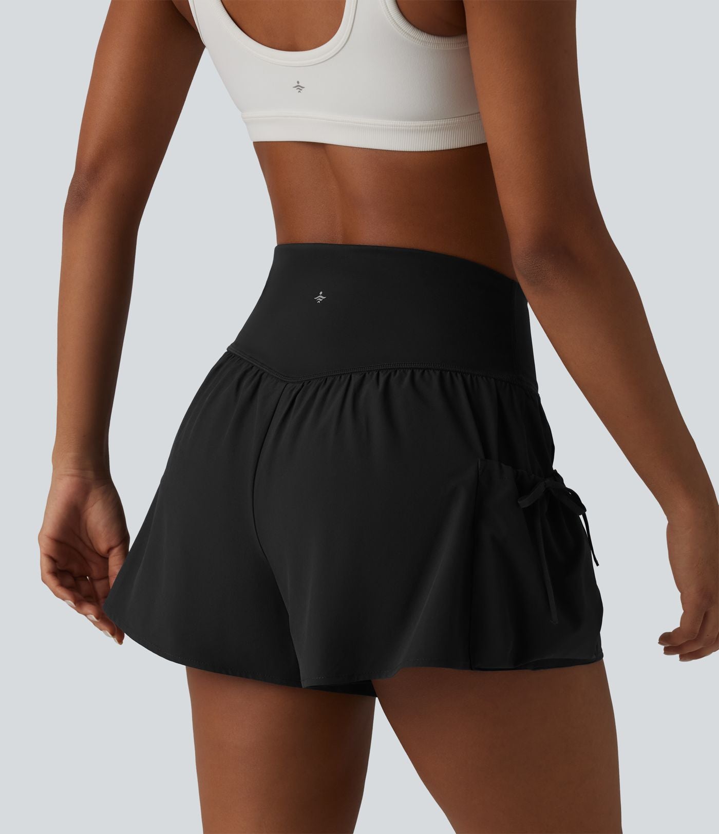Short de sport ample 2 en 1 taille haute avec poches