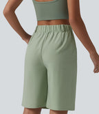 Bermuda ample infroissable taille haute plissé aspect lin avec fermeture éclair invisible et poches