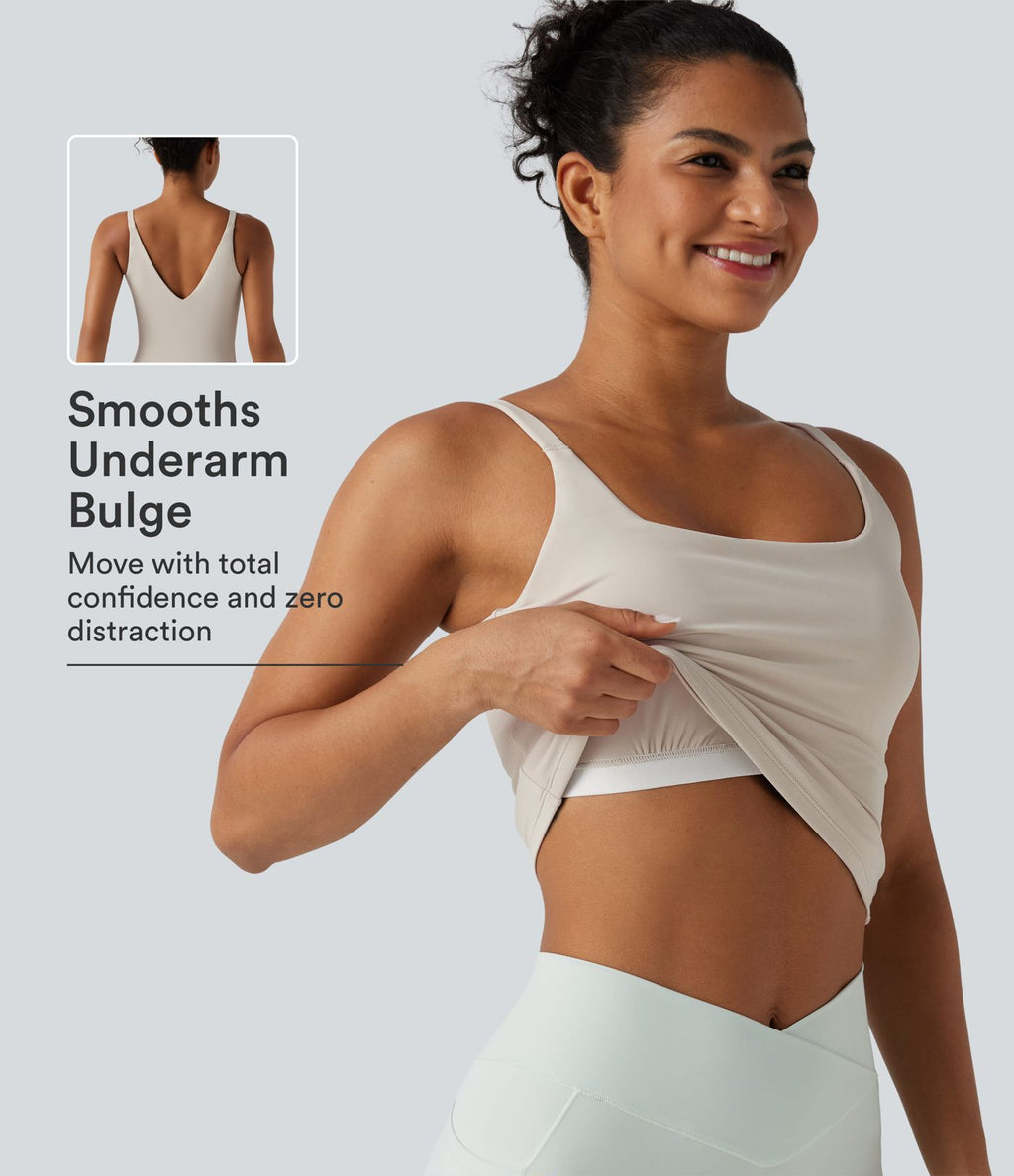 Débardeur de sport effet lissant sous les bras avec dos en V et brassière intégrée
