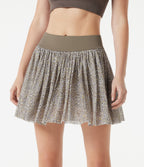 Jupe de sport mini 2-en-1 fluide taille mi-haute en mesh léopard avec poche