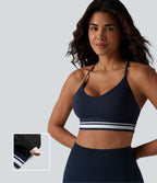 Brassière de sport SoftlyZero™ Plush à maintien léger, dos croisé ouvert, rayures color block et soutien intégré