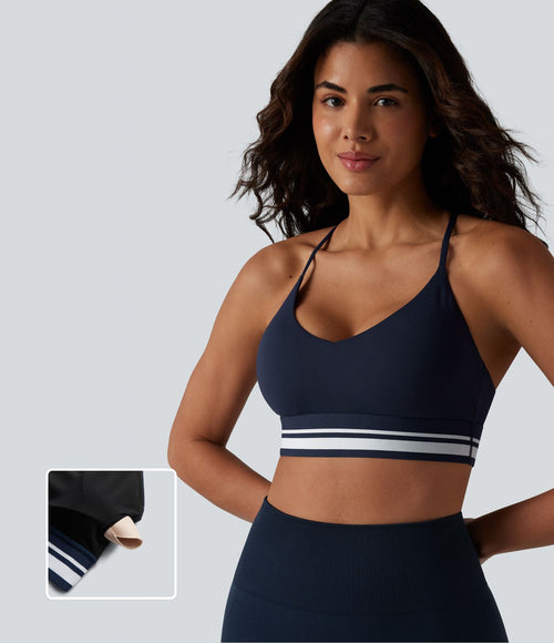 Brassière de sport SoftlyZero™ Plush à maintien léger, dos croisé ouvert, rayures color block et soutien intégré