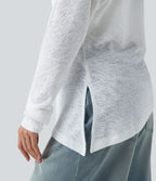 T-shirt décontracté semi-transparent une épaule dénudée à manches longues et ourlet asymétrique