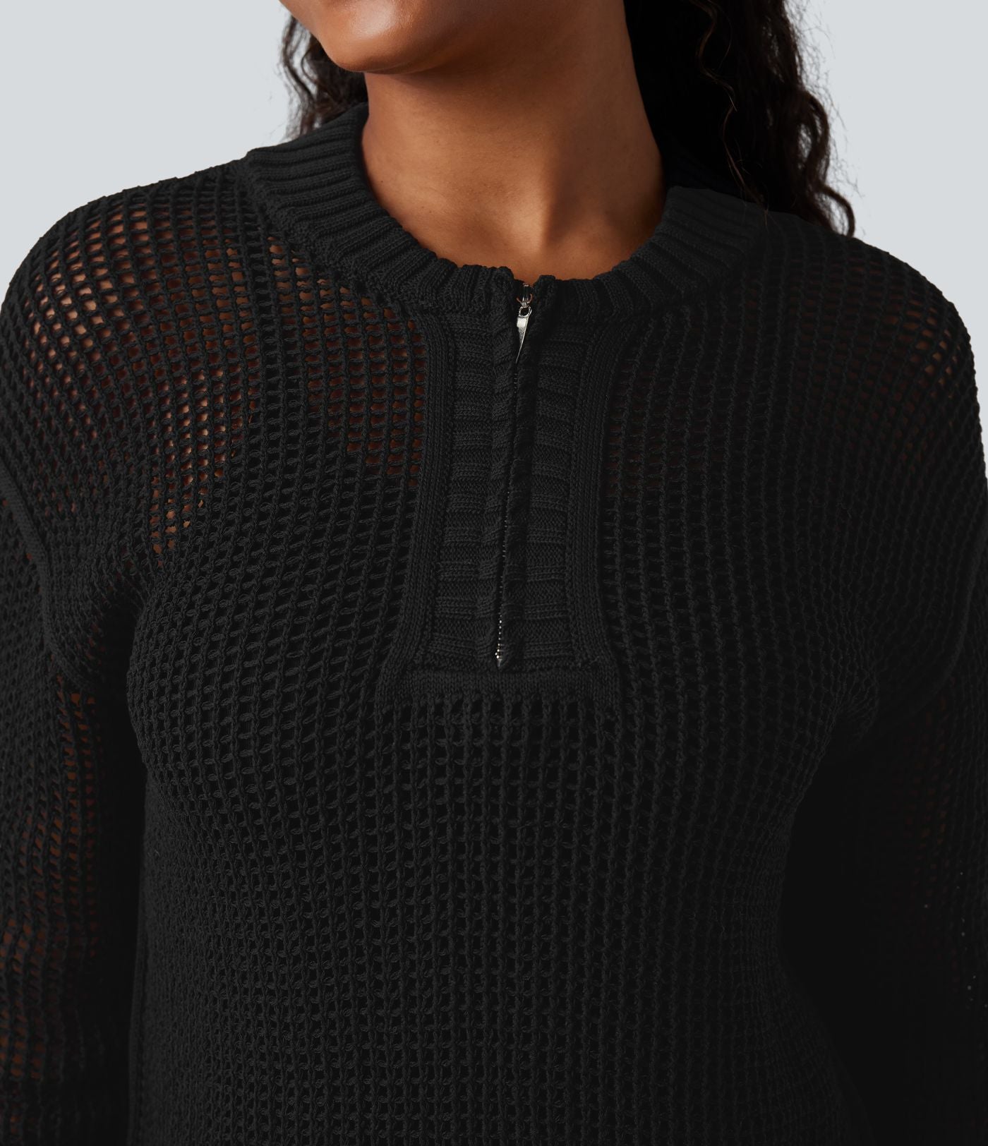 Pull ajouré demi-zip col rond manches longues