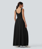 Robe maxi fluide dos nu, avec brassière intégrée et poches