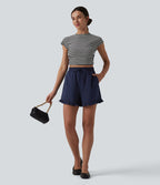 Short casual ample taille haute en popeline extensible à cordon de serrage et ourlet volants avec poches
