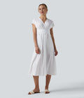 Robe midi Breezeful™ col V manches courtes à liens dans le dos séchage rapide avec poches latérales