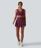 Breezeful™ Jupe mini sport 2 en 1 plissée taille haute mesh contrasté séchage rapide avec poches