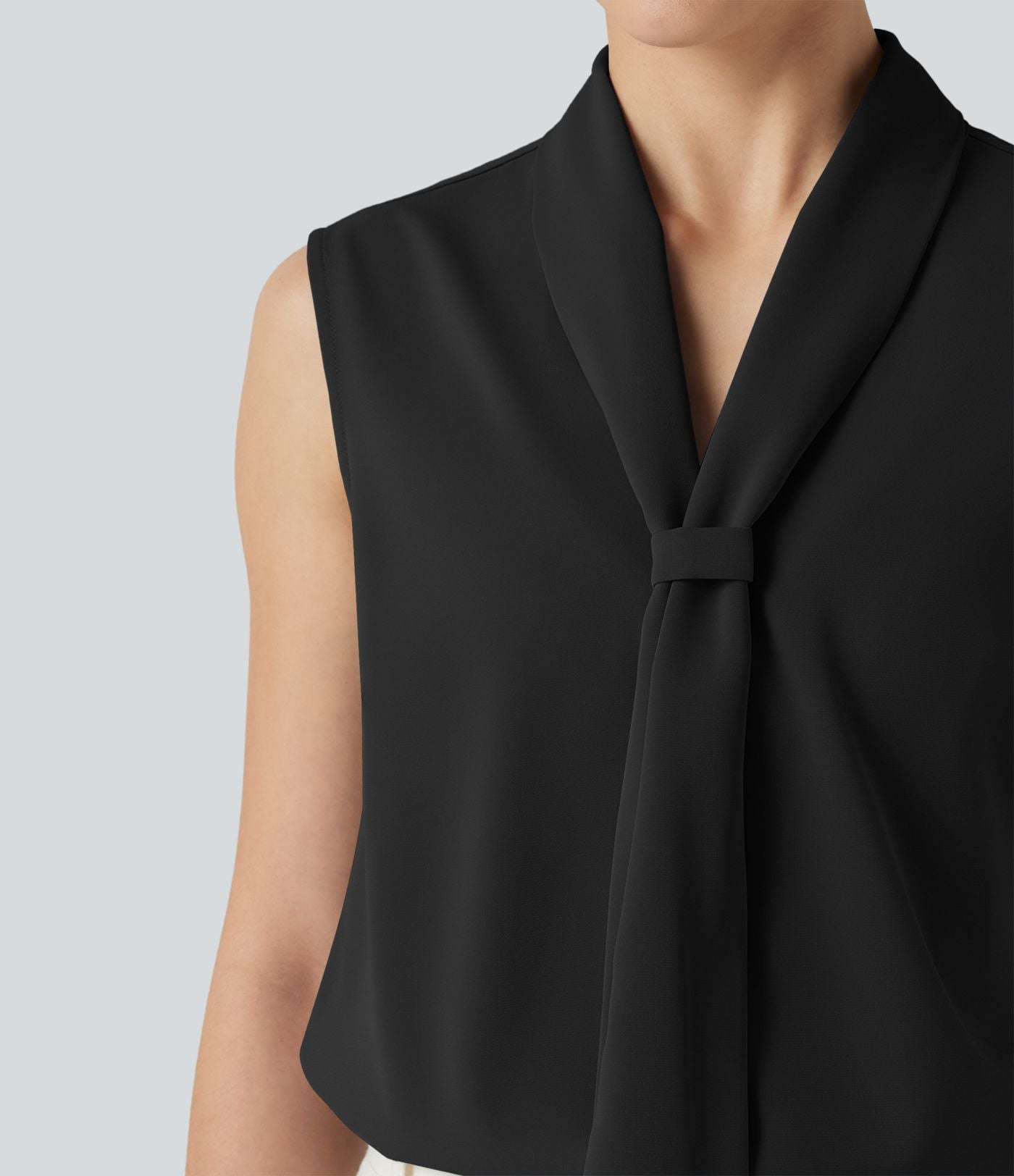 Blouse  sans manches esprit bureau défroissage facile, col V et lien à nouer