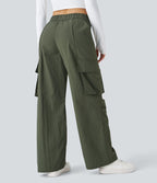Pantalon cargo décontracté à taille moyenne, jambes larges, boutons, fermeture éclair et poches latérales