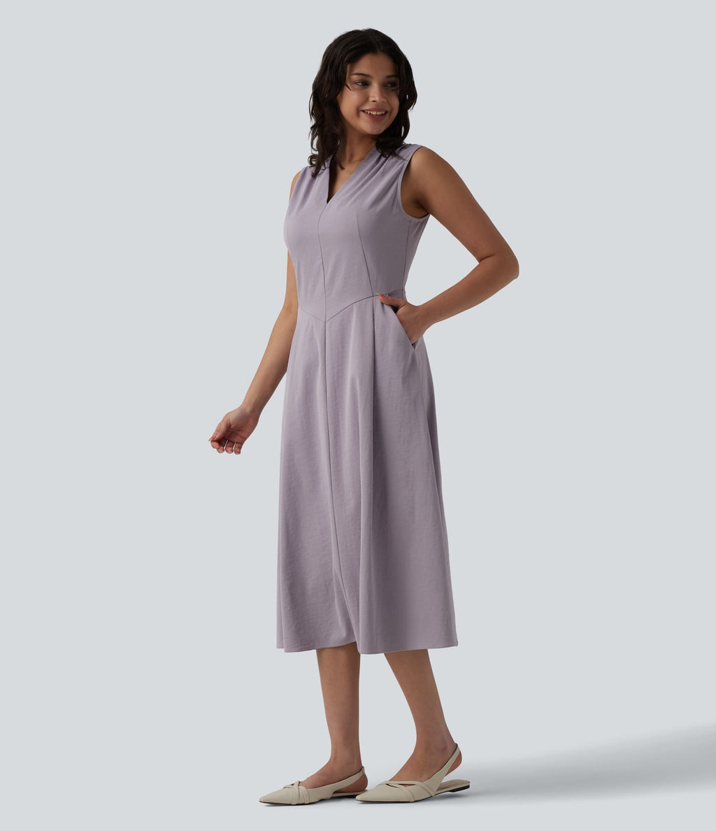 Robe mi-longue plissée col V sans manches avec fermeture éclair invisible et poches pour le travail