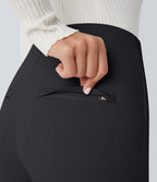 Pantalon tailleur skinny gainant taille haute à chevrons avec poches arrière zippées décoratives