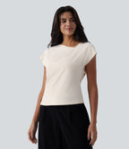 Blouse tailleur asymétrique col drapé manches courtes avec fronces et ourlet fendu