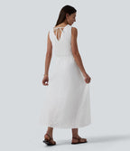 Robe mi-longue fluide col V sans manches avec nœud au dos