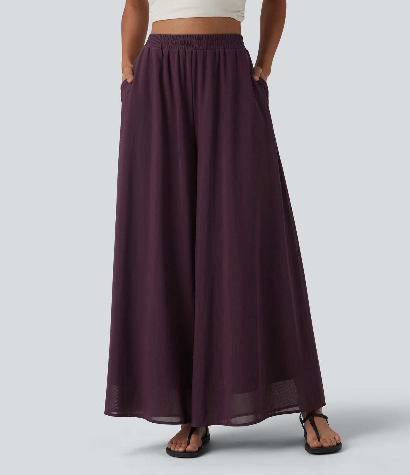 Pantalon fluide et ample avec superposition en mesh, poches latérales et taille haute