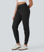 Pantalon jogging de voyage taille haute avec cordon de serrage, coupe fuselée et poches latérales zippées