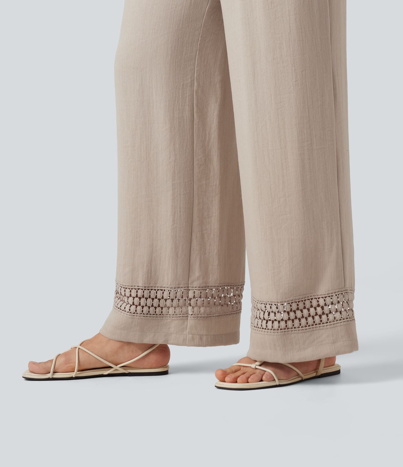 Pantalon effet lin taille haute avec cordon de serrage, bord volanté et poches