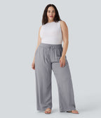 Pantalon décontracté grande taille large fluide taille haute effet lin avec cordon de serrage et poches