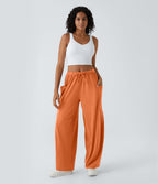 Pantalon Large Fluide Taille Mi-Haute Taille Élastique Cordon Poches Latérales Ourlet Flottant