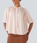 Blouse aspect lin col rond, manches mi-longues, boutonnée avec ourlet arrondi pour la détente