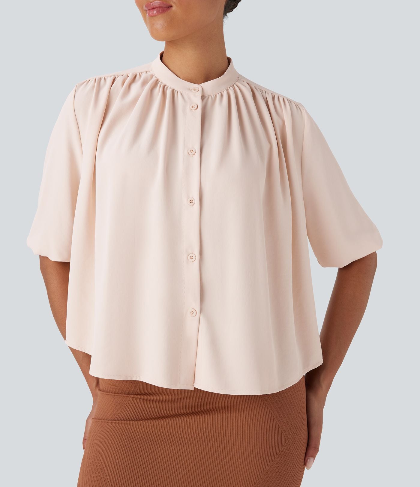 Blouse aspect lin col rond, manches mi-longues, boutonnée avec ourlet arrondi pour la détente