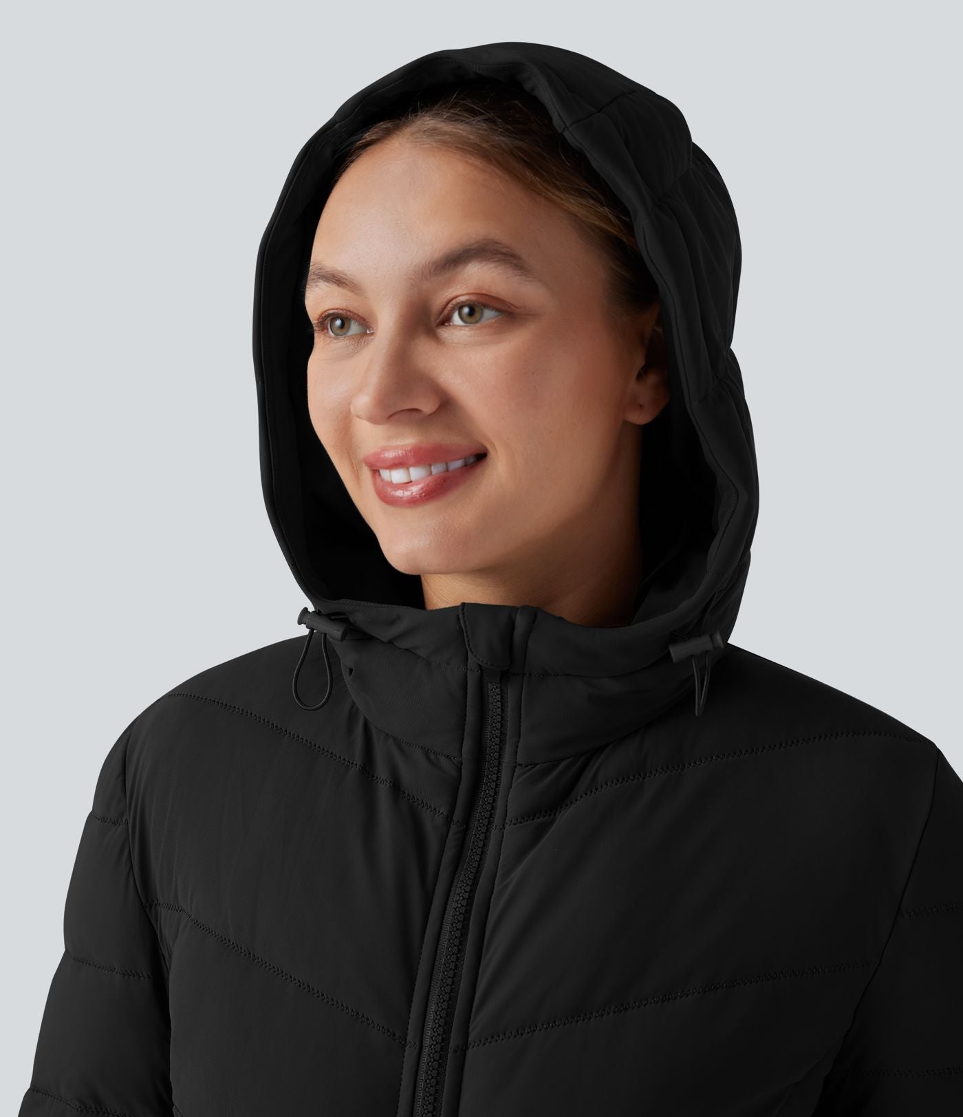 Doudoune longue extensible PuffFlex à capuche avec poches