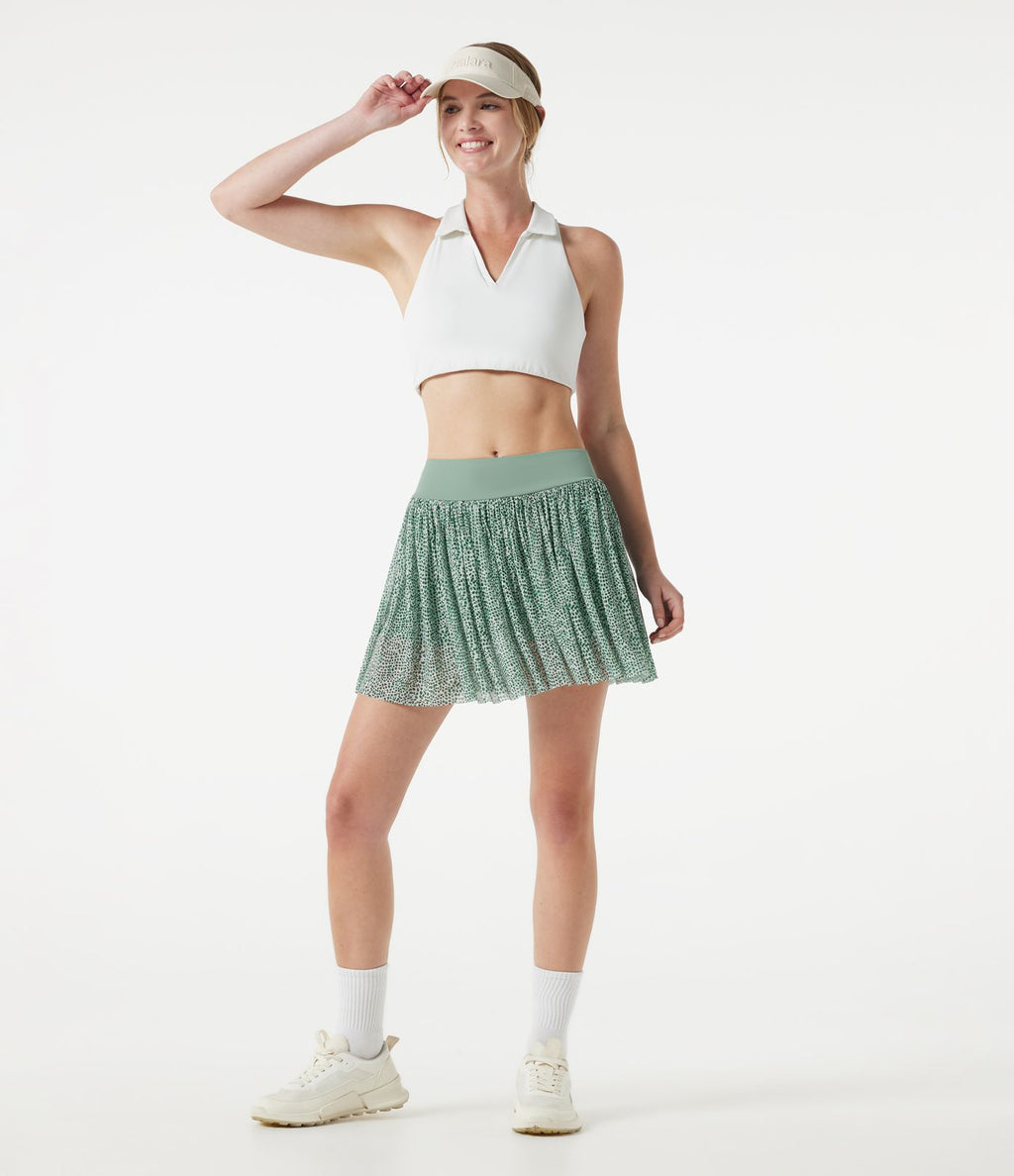 Jupe de sport mini 2-en-1 fluide taille mi-haute en mesh léopard avec poche