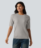 Pull col rond manches courtes en tissu gaufré