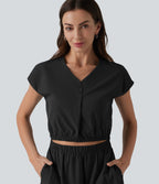 Robe col V manches courtes à découpes en popeline extensible avec poches
