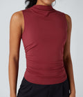 Top tailleur froncé col montant sans manches