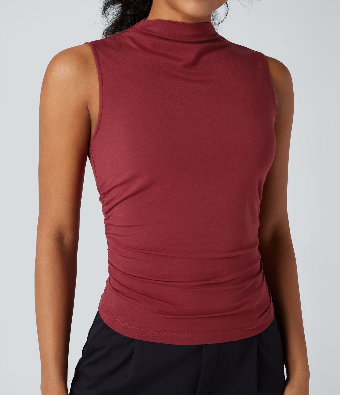 Top tailleur froncé col montant sans manches