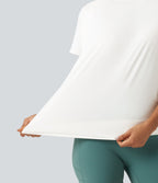 Haut de yoga effet frais InstantCool longueur allongée à manches courtes, encolure arrondie, fronces et protection solaire UPF50+