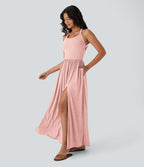 Robe longue fluide fendue avec poches latérales, dos nu et effet torsadé