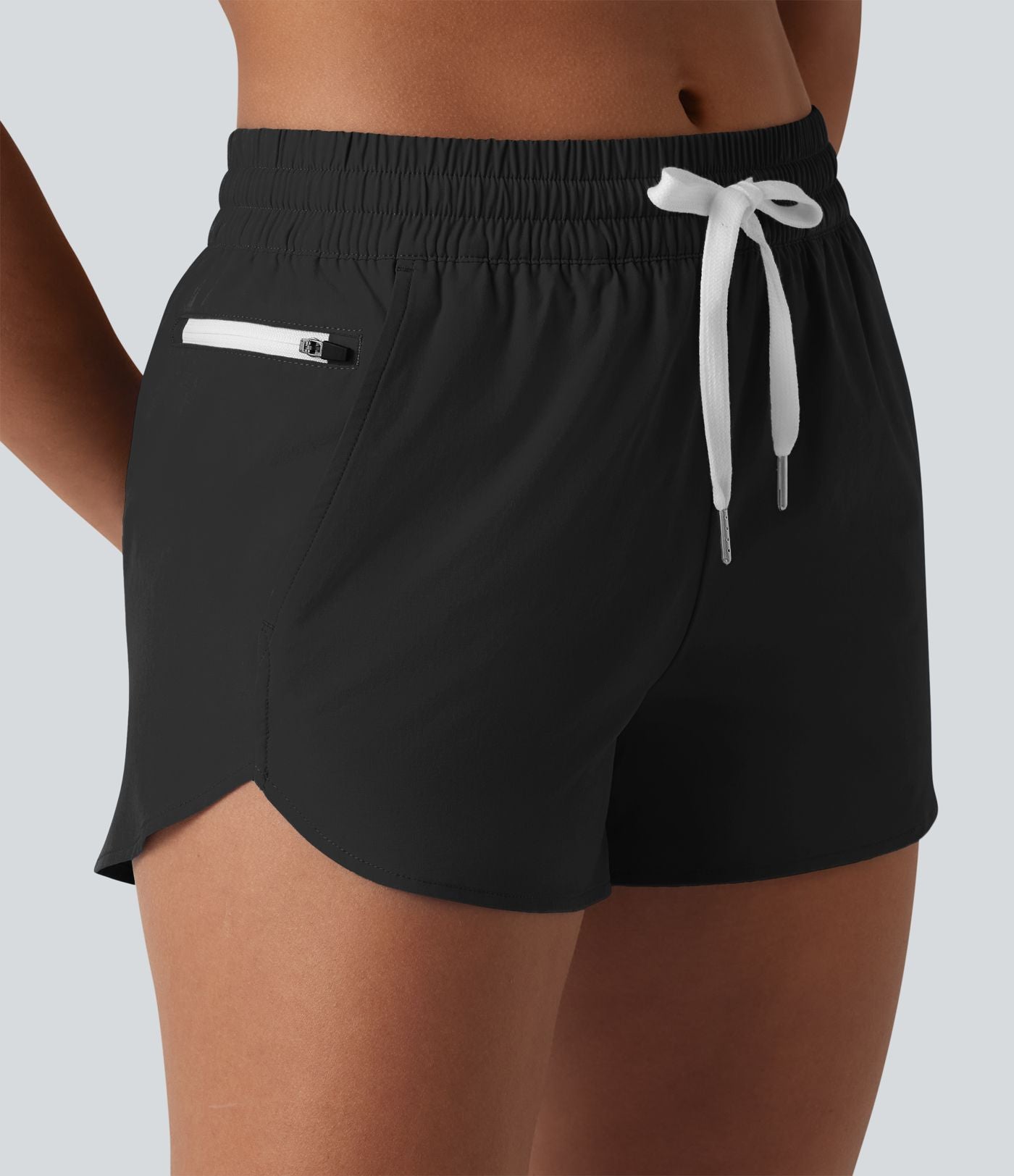 Breezeful™ Short de course taille mi-haute à séchage rapide, cordon de serrage, ourlet arrondi, sous-short intégré et poches