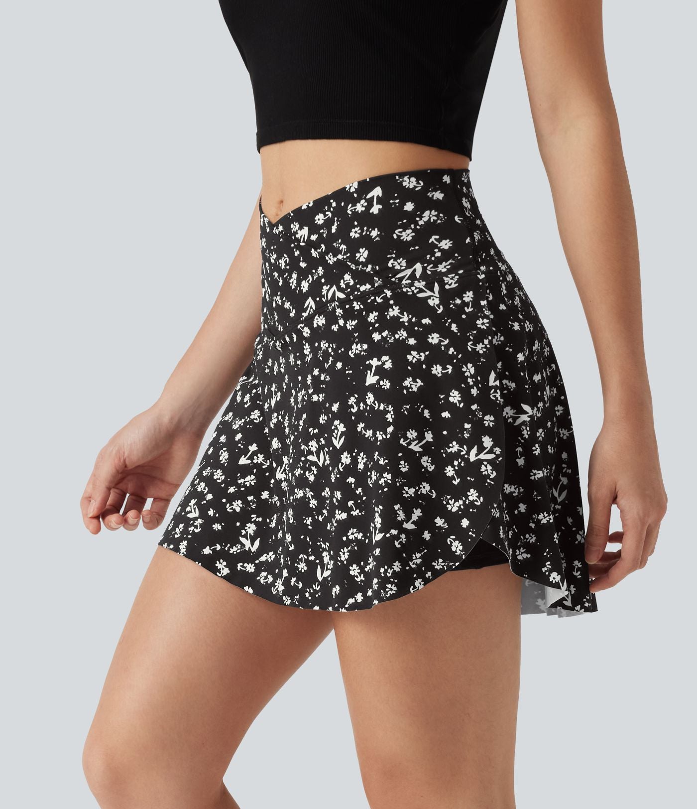 Jupe-short de tennis mini taille haute croisée imprimé léopard avec poches