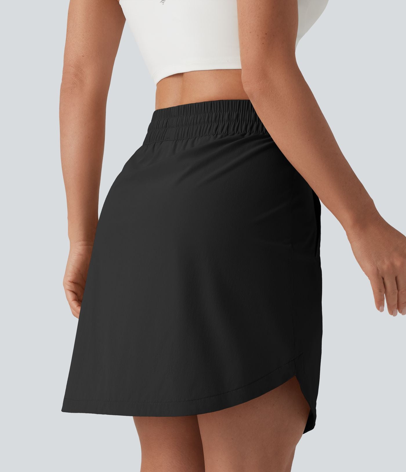 Jupe-short golf mini 2-en-1 taille haute à cordon de serrage et ourlet arrondi avec poches - Longueur plus longue