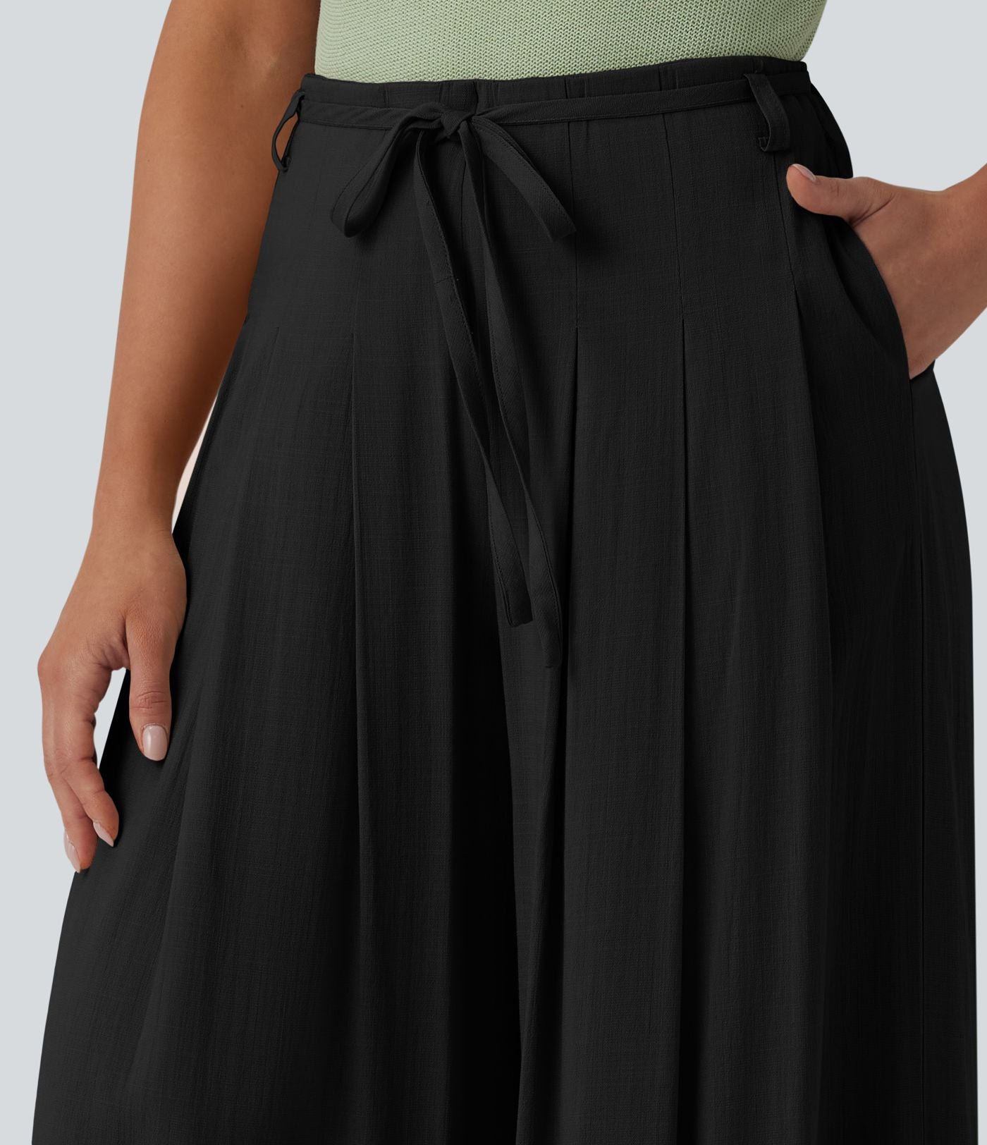 Pantalon large fluide taille mi-haute aspect lin avec ceinture et poches