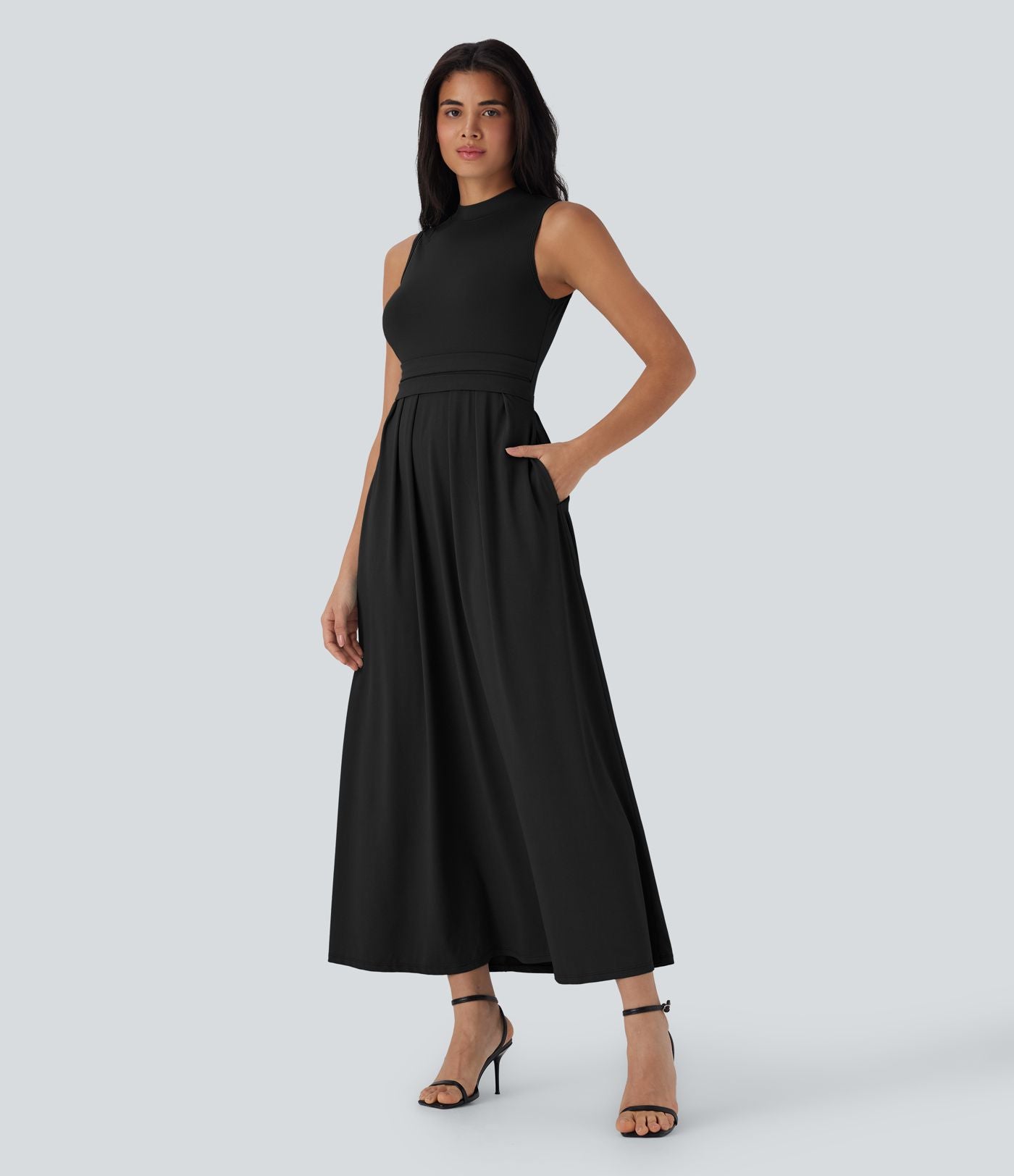 Robe longue décontractée sans manches à col montant, coupe évasée et poches latérales