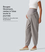 Pantalon de grossesse fuselé taille très haute en tissu gaufré avec poches
