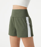 Short baggy de sport taille haute à séchage rapide avec bandes latérales et poches