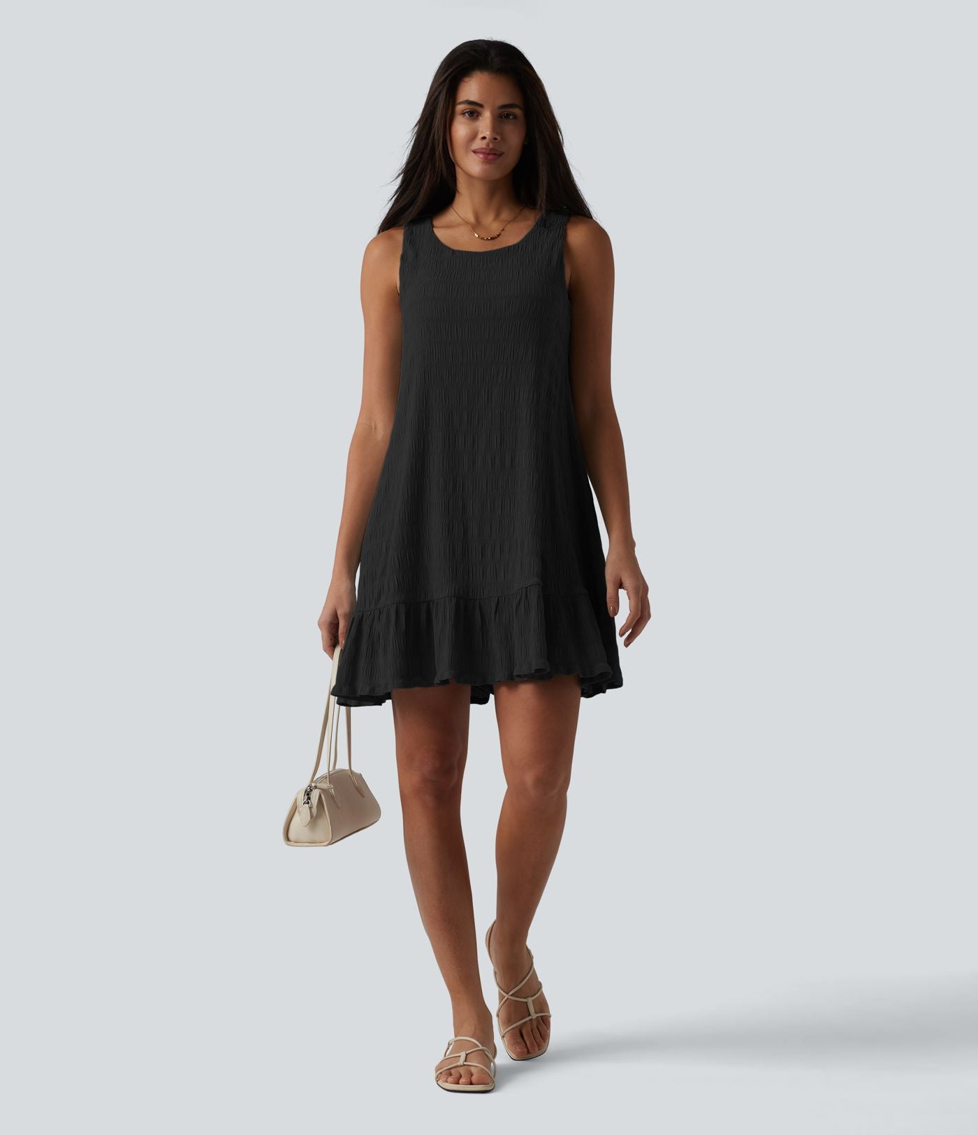 Robe courte décontractée sans manches à col rond, soutien-gorge intégré et ourlet à volants