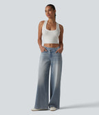 Halara Flex™ Jean large asymétrique taille basse avec bouton, fermeture éclair et poches multiples, délavé et extensible en maille