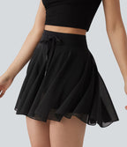 Jupe mini fluide évasée 2-en-1 taille haute à cordon, empiècements en mesh contrastant, avec poche, version plus longue