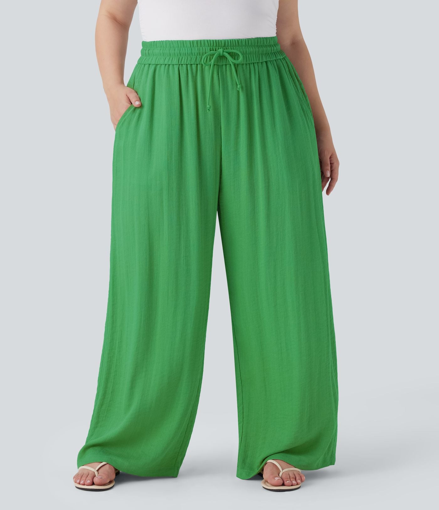 Pantalon décontracté grande taille large fluide taille haute effet lin avec cordon de serrage et poches
