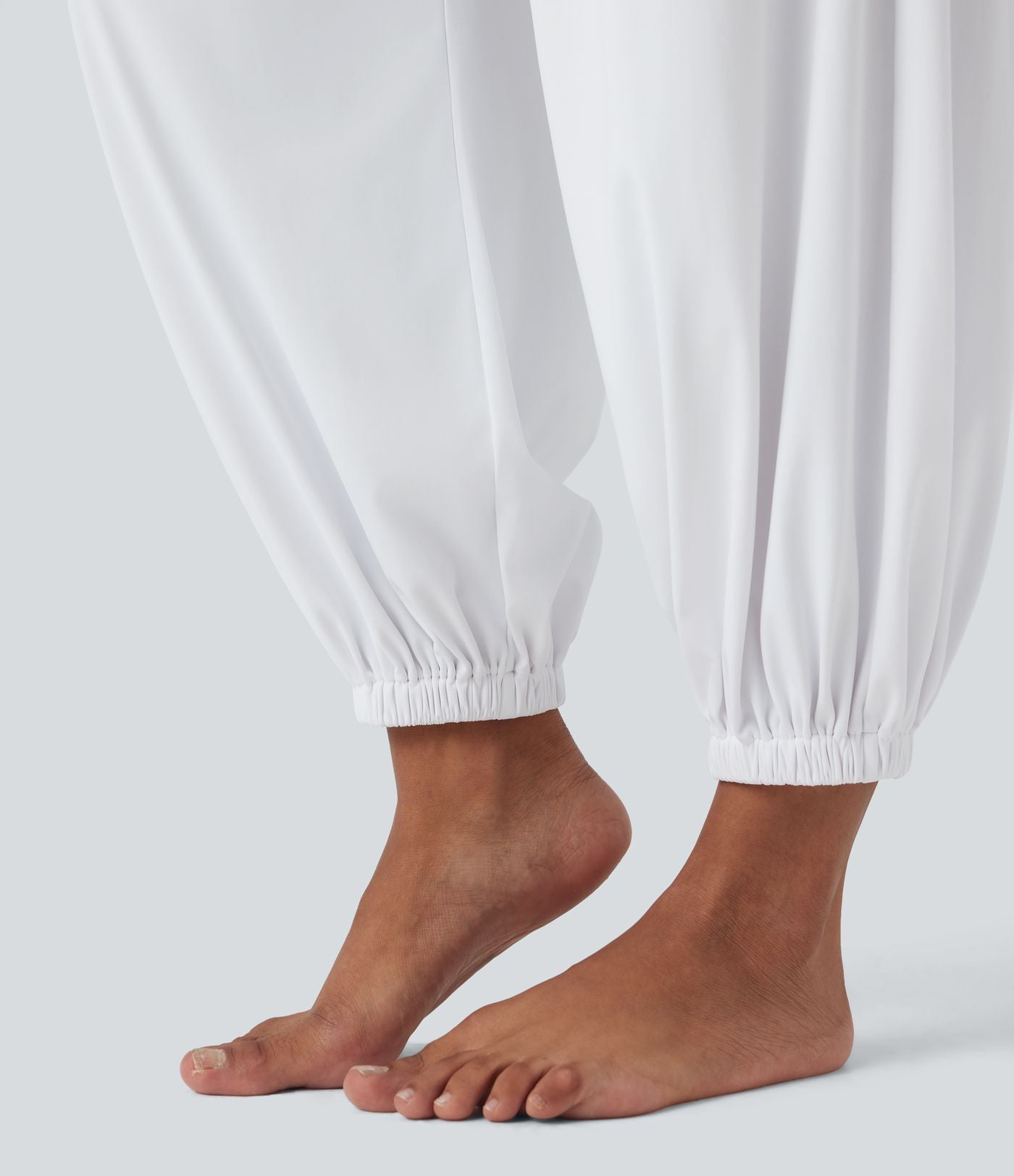 Salopette yoga SoftlyZero™ Airy col licou sans manches effet frais InstantCool avec poches, accès facile Easy Peasy, protection solaire UPF50+