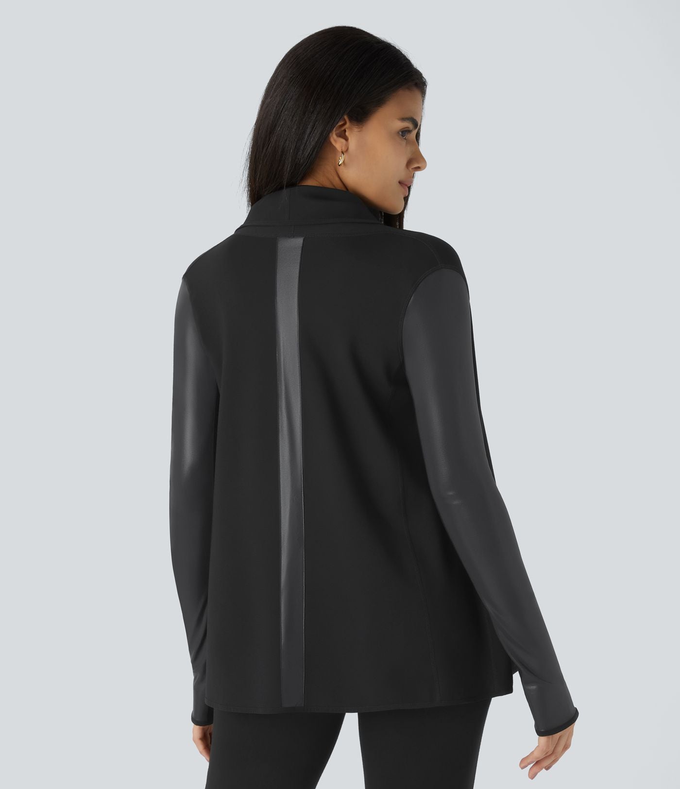 Veste de travail à pans asymétriques, boutons, passants pour pouces, poches latérales et empiècements contrastés