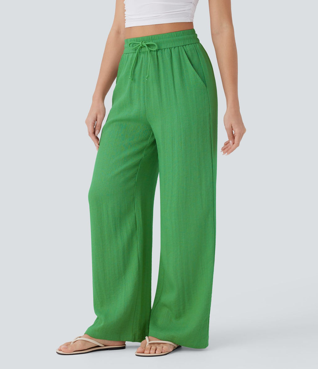 Pantalon large fluide taille haute avec cordon de serrage, poches latérales et aspect lin